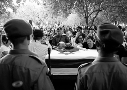 People mourn Israeli soldier Sgt. Amitai Alon, who was killed in the drone attack on Sunday. Gonzalo Fuentes/Reuters